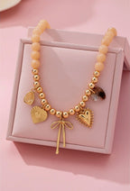 Blush Charm Whisper Necklace