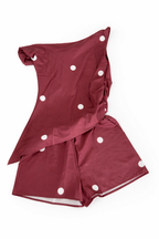 Polka dot brown asymmetrical top and shorts set.