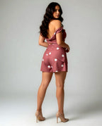 Polka dot brown asymmetrical top and shorts set.