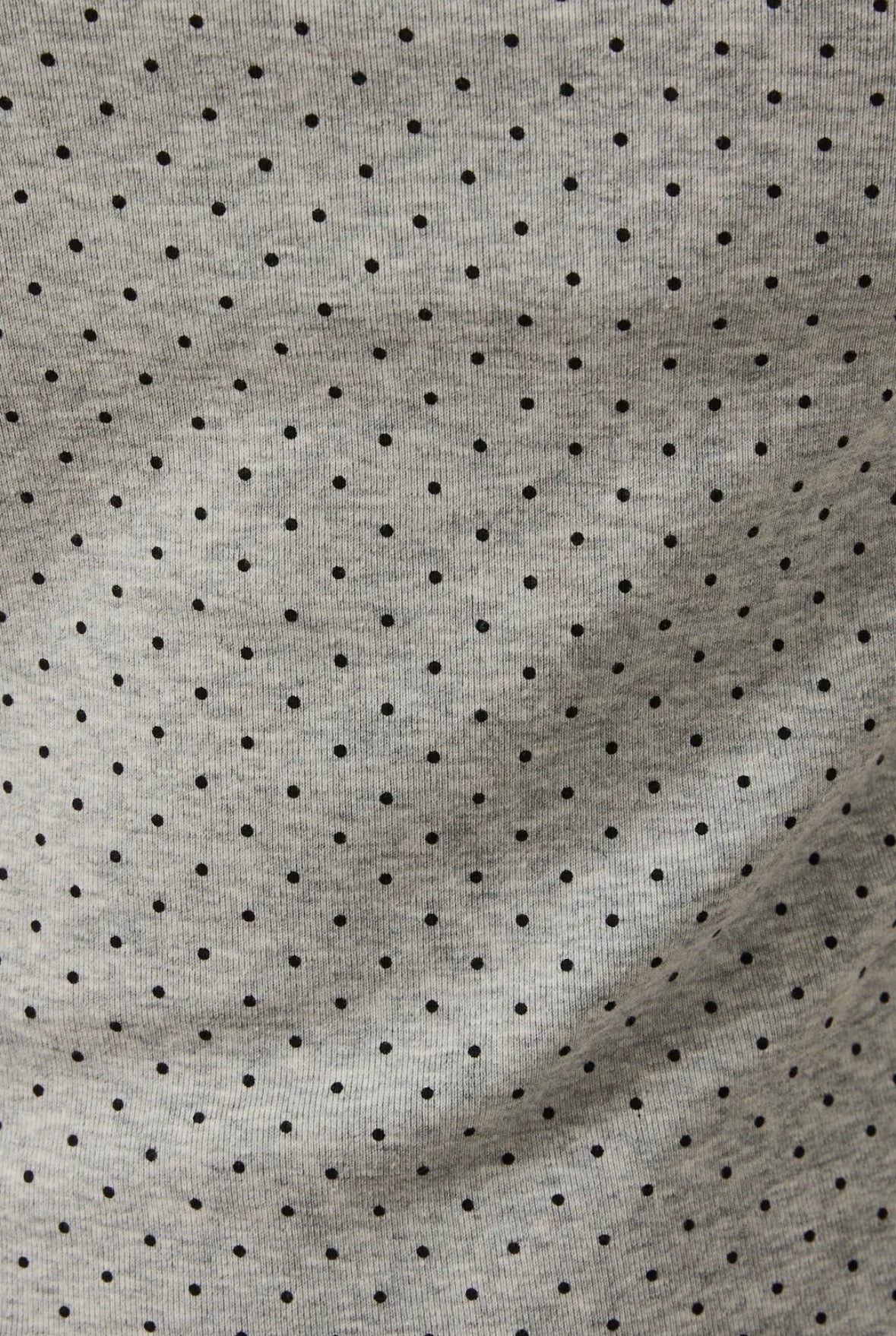 Gray fabric with black polka dot pattern